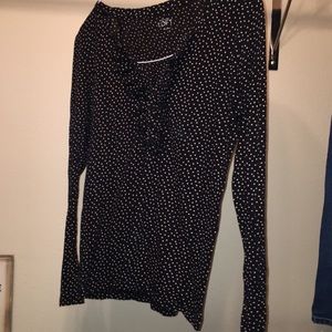 Black long sleeve with white polka dots.